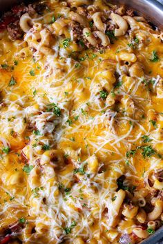 a casserole dish with cheese and meat in it