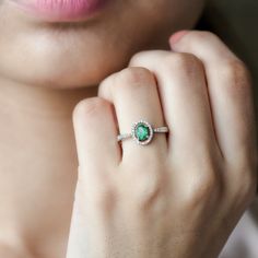 Product Details Strike a wonderful statement with this Halo Engagement Ring. Featuring an Oval shape Emerald secured in 4 Prong Setting while dainty Round diamonds studded as Halo and on the band of the ring. This Oval Emerald Ring makes a thoughtful gift for her so get it for the special person in your life and make her day even more memorable. Product Information SKU SHP-RINGS032218620 Width 3 mm Height 9.5 mm Weight 2.20 gm (Approximate) EMERALD INFORMATION No.of Stones 1 Pieces Total Weight Oval Emerald Ring, Halo Engagement Ring Emerald, Moissanite Engagement Ring Halo, Thoughtful Gifts For Her, Diamond Halo Engagement Ring, 18k Yellow Gold Ring, Halo Diamond Engagement Ring, Diamond Halo, Halo Engagement Ring