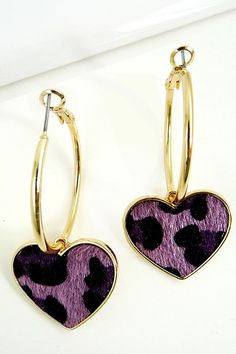 A fun hoop earring with a faux fur animal print heart charm.Size + FitDiameter: 1.25 "Decor: 1" Trendy Valentine's Day Hoop Earrings, Trendy Hoop Earrings With Heart Charm, Trendy Small Hoop Heart Earrings, Trendy Nickel-free Hoop Earrings For Valentine's Day, Trendy Gold Jewelry With Heart Print, Trendy Leopard Print Dangle Jewelry, Fur Animal, Heart Charm, Faux Fur