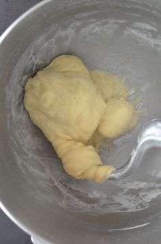 dough in a bowl with a spoon inside