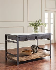 a wooden table with two drawers and a bowl on it