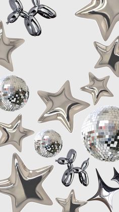 silver stars and disco balls floating in the air