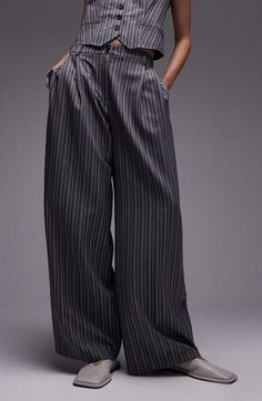 These low-rise pants are crafted from a seasonless blend for a modern polished vibe. 30 1/2" inseam; 24" leg opening; 12 1/2" front rise; 15 1/2" back rise (size 8) Zip fly with button closure Front slant pockets; back welt pockets 94% polyester, 6% viscose Machine wash, line dry Imported Slouchy Pants, Low Rise Pants, Contemporary Accessories, Slug, Designer Clothes For Men, Silver Foil, Women's Summer Fashion, Baggy Jeans, Athletic Women