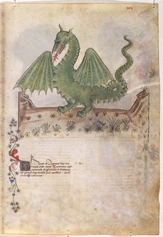 a green dragon sitting on top of a piece of paper with writing in it's center