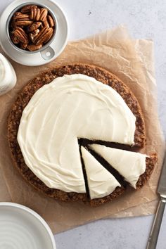 overhead view of carrot snack cake with cream cheese frosting with two cut slices Small Carrot Cake, Carrot Cake From Scratch, Decorator Frosting Recipe, Snack Cake Recipe, Citrus Glaze, Cake From Scratch, Moist Carrot Cakes, Carrot Cake Cupcakes