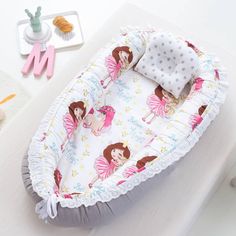 a baby bassinet is sitting on a table