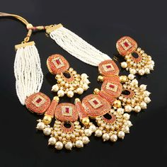 This is a stunning handmade choker necklace perfect for high end Jewelry Collector, a keeper in Traditional Vintage Indian/Pakistani Bridal jewelry and a Luxury Gift for your Daughter, Sister or Wife on Wedding or Anniversary. Perfect for any type of occasions, weddings And celebrations and a beautiful & memorable gift for weddings and special occasions. Description  Item Code:- L Gold Plated Fine Kundan & Pearl Cluster Choker Necklace Necklace Measures- Adjustable with a Dori/Cord Earring Measures- 62x45mm approx Quantity- One Necklace Set Please see more different designs here:- https://www.etsy.com/in-en/shop/LUCKYJEWELSART?ref=seller-platform-mcnav I make every item of my collection with a lot of love and care, I pay attention to every detail.  You are more than welcome to contact me f Luxury Heavy Kundan Necklace For Navratri, Luxury Kundan Necklace For Navratri Ceremonies, Luxury Pearl Kundan Necklace For Celebrations, Luxury Festive Choker Temple Necklace, Luxury Kundan Temple Jewelry Necklace For Navratri, Luxury Necklace For Navratri Celebration, Luxury Pearl Necklace With Meenakari, Luxury Temple Necklace For Navratri Celebration, Luxury White Meenakari Necklace