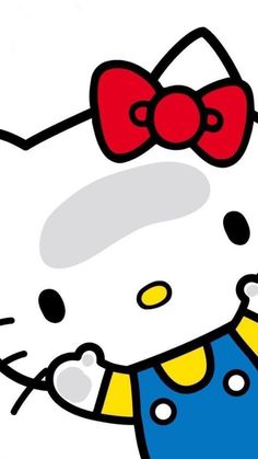 an image of a hello kitty with a bow on it's head and blue overalls