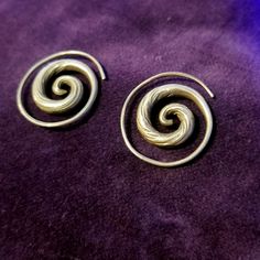 New, Never Worn Spiral Silver Earrings. These Are Unique, Artisan Made Earrings, Just Smaller Than I Anticipated. Please Note They Are Handmade, Therefore Not Perfect. 22mm Round, Penny For Scale. They Will Fit Standard Ear Piercings. Spiral Gauge Earrings, Hypoallergenic Spiral Metal Earrings, Spiral Ear Wire Earrings For Festival, Metal Spiral Wrap Earrings, Spiral Metal Wrap Earrings, Spiral Earrings For Festivals, Spiral Earrings For Festivals, Pierced Ears, Adjustable Spiral Nickel-free Earrings, Silver Spiral Brass Earrings