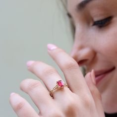 "This vintage inspired ring is set with a beautiful pink Ruby to make you feel like a princess A dainty and unique Celtic pattern to encircle your finger. Handmade by an inspired jewelry artist team with decades of experience in the craft of jewelry making. Each gemstone, each diamond is carefully picked. Using only the finest raw materials and the highest industry standard in manufacturing, design and finish. Set with a 7x5 Octagon cut Pink Ruby 1.06 ct All ring sizes available, if you cannot f Delicate Pink Rings With Rose Cut Diamonds, Pink Gemstone Stackable Rings In 14k Gold, Delicate Pink Jewelry With Rose Cut Diamonds, Dainty Pink Jewelry With Rose Cut Diamonds, Dainty Pink Solitaire Ring, Elegant Pink Emerald Cut Ruby Ring, Dainty Pink Rose Cut Diamond Jewelry, Elegant Pink Birthstone Stackable Rings, Elegant Pink Stackable Birthstone Rings