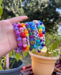 Handmade Fun Friendship Bracelets, Fun Rainbow Beaded Bracelets For Festivals, Rainbow Beaded Bracelets For Friendship, Funky Handmade Beaded Bracelets For Gifts, Funky Multicolor Beaded Bracelets As Gift, Handmade Beaded Bracelet For Friendship, Funky Beaded Bracelets For Gifts, White Handmade Beaded Bracelets For Rave, Fun Festival Bracelets