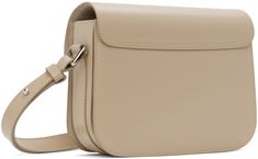 Buffed leather shoulder bag in beige. · Adjustable post-stud shoulder strap · Logo embossed at face · Tab-slot foldover flap · Three-compartment interior · Partial suede lining · Partial cotton twill lining · Silver-tone hardware · H5.75 x W8 x D2 Supplier color: Beige Classic Beige Shoulder Bag With Double Flap, Classic Beige Double Flap Shoulder Bag, Beige Double Flap Shoulder Bag For Travel, Beige Double Flap Bag With Detachable Strap, Beige Flap Bag For Business, Beige Double Flap Leather Bag, Beige Leather Flap Bag, Beige Flap Shoulder Bag For Business, Beige Leather Flap Satchel