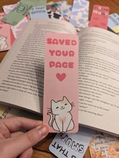 a bookmark that says save your page with a cat on it and hearts in the background