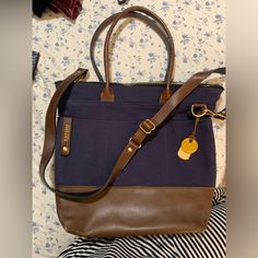 Nwot- Navy And Brown Leather Navy Satchel Shoulder Bag For On-the-go, Blue Canvas Shoulder Bag With Top Handle, Blue Tote Laptop Bag, Blue Satchel Laptop Bag, Everyday Blue Satchel Laptop Bag, Blue Satchel For Everyday Use, Blue Everyday Laptop Satchel, Blue Everyday Laptop Satchel Bag, Everyday Blue Leather Laptop Bag