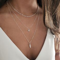 PRODUCT DESCRIPTION A lovely trio of dainty sterling silver Layered necklaces with CZ lotus charm, and drop charm, to wear in the popular layered style. The chains in the set are a unique swirl chain and rolo chain. This boho-chic minimal style Layers up your look with sparkling charm. MEASUREMENT AND SIZE (on the model) This set comes with 2 inches extender chain ✦The length of the 1st necklace is 15 inches (38cm) ✦The total length of the 2nd necklace is 17inches (42 cm) ✦The total length of th 3 Layer Necklace Silver, Stacking Silver Necklace, Stackable Necklaces Silver, Prom Necklaces Silver, Layering Gold And Silver Necklaces, Sterling Silver Necklaces Unique, Necklace Combinations Silver, Silver Jewelry Women, Layered Necklaces Silver Aesthetic