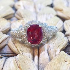 Fine Jewelry Cushion Cut Gemstone With Center Stone, Red Platinum Ring With Center Stone, Ruby Rings With Pave Setting, Red Center Stone Platinum Ring, Red Formal Jewelry With Pave Setting, Brilliant Cut Ruby Gemstones Fine Jewelry, Brilliant Cut Ruby Gemstones For Fine Jewelry, Red Jewelry With Pave Setting For Formal Occasions, Red Pave Setting Jewelry For Formal Occasions