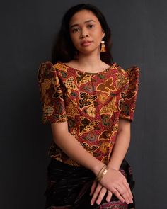 Modern Filipiniana meets Southeast Asian batik. A beautiful terno blouse with butterfly batik fabric. Iconic Filipiniana butterfly sleeves. DETAILS Sizes: S/M up to 38” over bust. M/L up to 40” over bust. L/XL up to 43” over bust (has fuller butterfly sleeves). Make: Individually crafted with batik cotton made in Indonesia and sourced from Maguindanao, Philippines. Care: Hand wash and air dry. Batik Butterfly, Batik Blouse, Sleeves Details, Southeast Asian, Butterfly Sleeves, Batik Fabric, Air Dry