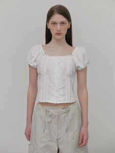 This is a trendy and feminine top by ETMON that is made out of high quality and sturdy material. With distinctive mood of the design and modern feminine look, you can style it for your casual daily outfit.- Lovely lace detail and puff sleeves- Square neckline and elastic cuffs- Feminine and trendy look Square Neck Lace Top, Chic Square Neck Top With Lace Trim, Chic Square Neck Tops With Lace Trim, Chic White Puff Sleeve Top With Square Neck, White Puff Sleeve Top With Lace Trim, Feminine Lace Top With Puff Sleeves, White Feminine Puff Sleeve Top With Square Neck, Spring Fitted Lace Top With Puff Sleeves, White Fitted Puff Sleeve Top