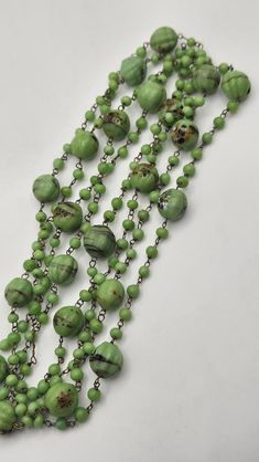 Vintage extra long milifiore green glass bead necklace. Each bead is individually wire wrapped by hand. Overall in very good to excellent condition. Measures about 54" long end to end. Long Bead Necklace, Chandler Az, Long Beaded Necklace, Beaded Necklaces, Glass Bead Necklace, Vintage Jewellery, Glass Bead, Bead Necklace, Green Glass