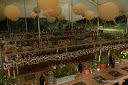 a large room filled with lots of tables covered in bottles and paper lanterns hanging from the ceiling