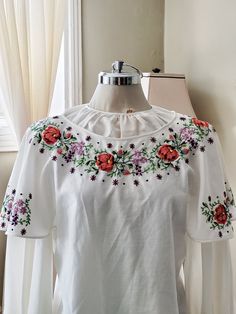 Vintage embroidered floral blouse top  cotton it will fit   S  measures are: Shoulder to shoulder:16inches Sleeves 22 inches Bust 38nches Length:25nches  .Excellent condition White Long Sleeve Blouse With Floral Applique, Spring White Blouse With Embroidered Neckline, White Cotton Peasant Top With Embroidered Sleeves, White Floral Embroidered Blouse For Spring, White Short Sleeve Blouse With Embroidered Sleeves, White Blouse With Embroidered Short Sleeves, Spring White Peasant Top With Embroidered Sleeves, White Peasant Top With Embroidered Sleeves For Spring, Spring White Blouse With Floral Applique