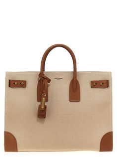 saint-laurent-sac-de-jour-large-handbag-1725038991252857197-0 Designer Canvas Bag With Top Handle, Designer Brown Canvas Bag With Top Handle, Designer Canvas Bag With Detachable Handle For Travel, Luxury Brown Top Handle Canvas Bag, Designer Beige Top Handle Canvas Bag, Designer Tote Briefcase With Gold-tone Hardware, Designer Canvas Travel Bag With Top Handle, Designer Top Handle Canvas Bag For Travel, Designer Travel Canvas Bag With Top Handle