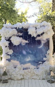 an art piece made out of clouds and stars