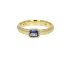 With its cool toned color and subtle sparkle, this Elizabeth Street ring is a stunning, modern alternative to the traditional sapphire solitaire. The radiant cut pale blue sapphire is set set in an 18K yellow gold bezel at the center of the satin finished 18K yellow gold band. Alone or paired with any of your other favorites, it has a statement making sophistication. radiant cut blue sapphire : 4mm x 5mm : .47ct18K yellow gold band : 3mmsize available : 6.5please contact us for sizing options Fine Jewelry Gold Sapphire Ring With Radiant Cut, Classic Sapphire Ring In 14k Gold Radiant Cut, Classic Radiant Cut Sapphire Ring In 14k Gold, Modern Radiant Cut Sapphire Ring, Classic 14k Gold Sapphire Ring, Radiant Cut, Three Pearl Ring, Greek Ring, Rainbow Sapphires, White Sapphire Ring