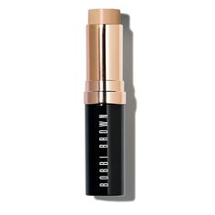 On-the-go cream foundation stick | Bobbi Brown Skin Foundation Stick, Neutral Honey (N-060) - 0.31 oz/9g | After moisturizing skin, lightly glide across forehead, cheeks, nose, and chin. Blend with fingertips, a sponge, or our Foundation Brush (sold separately). Build coverage as desired. | A portable cream foundation stick that glides on weightless medium-to-full coverage that lasts all day. This versatile stick foundation effortlessly evens out your complexion and conceals imperfections with r Maquillaje Glowy, Brown Skin Foundation, Cosmetic Business, Bobbi Brown Skin Foundation, Bobbie Brown, Foundation Contouring, Moisturizing Foundation, How To Match Foundation, Foundation Stick