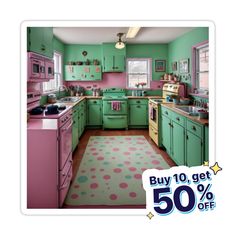 a green and pink kitchen with polka dot rug on the floor next to stove top oven