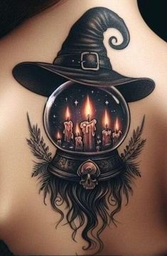 a woman's back with candles and witches hat on it