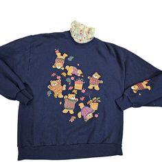 Vintage 90s Womens Large Teddy Bears Crewneck Sweatshirt Leaves Fall Turtleneck    Dark blue  Puffy graphic  Attached turtleneck neckline of checkered leaves and acorns  Teddy bears in sweaters playing in the leaves  Made in USA  Approximate measurements laid flat   Chest 20.5"  Length 24" Teddy Bear Sweatshirt, Fall Turtleneck, Large Teddy Bear, Red Crewneck, Leaves Fall, Funny Sweatshirts, Flat Chest, Teddy Bears, Casual Sweatshirt