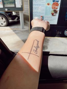 a woman's arm with a tattoo on it that reads, i love you