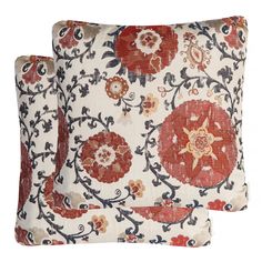 two red and white pillows with floral designs on the front, one is made out of fabric