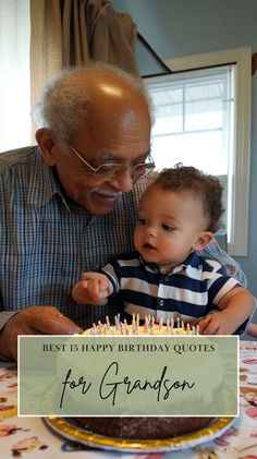 an older man holding a young boy in front of a birthday cake