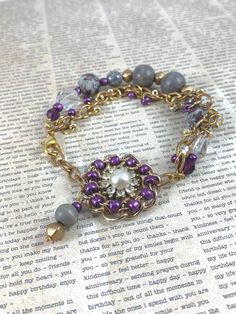 An unlikely combination of vintage repurposed earring, glass beads, wooden beads, brass chain, purple, gray, and gold. But they all got together and formed a fun, eclectic, funky friendship. Measures 8" but can be worn smaller Arrives gift wrapped and free shipping Bohemian Purple Beaded Chain Bracelets, Handmade Purple Metal Beaded Bracelets, Handmade Vintage Purple Bracelets, Jewelry Repurposed, Vintage Repurposed, Assemblage Jewelry, Repurposed Vintage, Fort Collins, Purple Gray