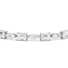 This diamond bracelet combines the flawless fusion of edgy elegance and timeless sophistication Designed with emerald-cut diamonds and marquise diamonds and arranged alternately into a single line and all in an east-west setting, this tennis bracelet offers versatility that suits any occasion. Edgy Elegance, Single Line, Eternity Ring Diamond, Marquise Diamond, Fancy Color Diamonds, Emerald Cut Diamonds, East West, Earrings Collection, High Jewelry