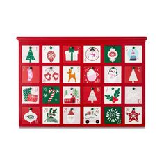 a large red christmas calendar with lots of holiday decorations on it's sides and numbers