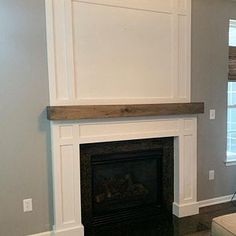 a living room with a fire place in it