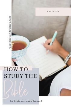 a woman sitting on a couch holding a cup of tea and writing in a notebook