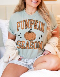 Embrace the cozy charm of fall with our Vintage Pumpkin Patch Tee! This adorable shirt features a nostalgic pumpkin design that brings back all the feels of crisp autumn air, hayrides, and harvest festivals. Made from soft, breathable fabric, it's perfect for layering under your favorite flannel or wearing on its own for a casual, cute look. Celebrate the season in style with this timeless piece that's sure to become your go-to fall favorite! Harvest Festivals, Vintage Pumpkin, Crisp Autumn, Harvest Festival, The Feels, All The Feels, Fall Favorites, Pumpkin Design, Pumpkin Patch