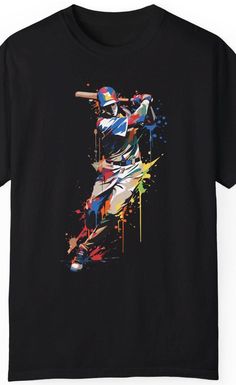 Baseball Player Art T-Shirt, Colorful Abstract Design Tee, Splatter Paint Baseball Theme, Vibrant Sports Fan Gift, Unisex Apparel This vibrant baseball player art T-shirt features a dynamic splatter paint design, perfect for sports enthusiasts who appreciate unique style. Show off your passion for baseball with this colorful abstract tee, ideal for everyday wear or as a special gift for fans. Unisex and versatile, it's a striking addition to any wardrobe, capturing the energy of the game in a cr Multicolor Sublimation Print T-shirt For Sports Events, Multicolor Crew Neck T-shirt For Sports Events, Sporty Multicolor Graphic Print T-shirt, Multicolor Graphic Print Sporty T-shirt, Multicolor Graphic Print T-shirt For Sports, Black Graphic Tee With Paint Splatter, Black Paint Splatter Cotton T-shirt, Multicolor Cotton T-shirt For Sports Events, Multicolor Cotton T-shirt For Sports