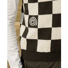 Designed and knitted in North London with a zero-waste production process and sustainable yarns. The checkered design features wool embroidered symbols across the body.   As the temperatures drop, this cozy knitted jumper is your go-to for warmth and style. Its eye-catching design pairs beautifully with your favourite trousers and jeans. Available in classic black and white, it offers a bold look that fits into any wardrobe. We use an Italian yarn blend of 90% wool and 10% cashmere which promises exceptional warmth and comfort. The versatile v-neck cut makes it ideal for layering with a t-shirt or shirt during the colder months. Made in London  90% Wool, 10% Cashmere  Dry clean Checkered Design, Summer Color Palette, Vest Men, Scandinavian Minimalism, Stocking Fillers For Her, Forever Jewelry, North London, Jewelry Ring Box, Pet Gift