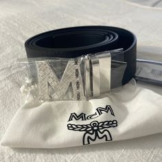 Never Worn Authentic Mcm Reversible Adjustable Belt. Brought As A Present From Saks. Black. Can Be Taken To The Mcm Store To Cut To Your Size. Comes From A Smoke Free Home. Please Feel Free To Message Me With Any Questions. Offers Are Welcome. Mcm Belt, A Present, Reversible Belt, Adjustable Belt, Black And Silver, Black Silver, Mens Accessories, Feel Free, Bring It On