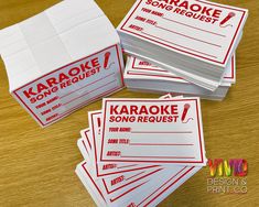 four karaoke song request cards stacked on top of each other with the word karaoke in red