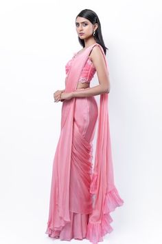 Rose pink concept pre-draped skirt saree with detachable pallu. Paired with thread, bead, 3D petal, sequin, pipe bead, pearl and zardozi embellished padded blouse. - Aza Fashions Fitted Bollywood Dress With Draped Sleeves, Fitted Silk Dupatta Draped, Fitted Draped Choli With Pallu, Wedding Choli With Draped Sleeves, Pre-draped Fitted Saree With Dupatta, Pre-draped Fitted Blouse Piece For Wedding, Wedding Draped Dupatta, Fitted Wedding Blouse Piece Pre-draped, Pre-draped Wedding Sets