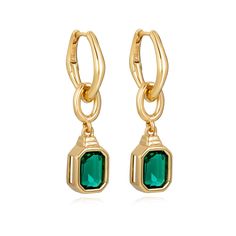 Designed to compliment every look, each earring features a delicate gold huggie with a drop down emerald pendant.  You can keep it classy with our emerald pendant or wear the huggies on its own for a simpler look - a multi-functional earring with a versatile nature. All of our 18k gold or silver plated jewellery should be stored in a cool, dry place and cleaned carefully with a soft non-abrasive cloth to maintain shine. Our pieces also contain real glass stones, cubic zirconia or freshwater pear Gold Jewellry, Emerald Pendant, Keep It Classy, Classy Jewelry, Jewelry Lookbook, Silver Plated Jewelry, Emerald Earrings, Green Earrings, Timeless Jewelry