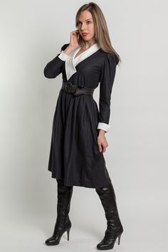 "This little dress has a contrasting white lapel collar that crosses over with three buttons. The sleeves are long with cuffs that fold up. The waist is elastic and the skirt has pockets at the hips. The dress is very soft similar to flannel and the collar/cuffs are made of a snaggy woven material.  { d e t a i l s } c o l o r : charcoal grey and white m a t e r i a l : poly blend m a k e r : Act I size on tag: 6 best fit for size: small { c o n d i t i o n }  excellent { m e a s u r e m e n t s Fitted Belted Long Sleeve Dress For Work, Fitted Long Sleeve Belted Dress For Work, Elegant Daywear Dress With Striped Collar, Elegant Dresses With Striped Collar For Daywear, Fitted V-neck Midi Dress With Button Cuffs, Formal Fitted Long Sleeve Wrap Dress, Formal Long Sleeve Fitted Wrap Dress, Formal Long Sleeve Midi Dress With Fitted Waist, Classic Workwear Dress With Striped Collar