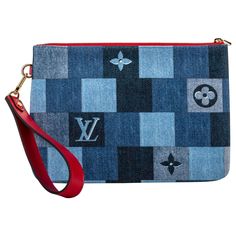 Louis Vuitton limited edition denim pouchette with red leather details. Detachable handle. Comes with booklet, dust cover, original box and ribbon. Louis Vuitton Jeans, Louis Vuitton Box, Louis Vuitton Red, Louis Vuitton Limited Edition, Designer Name, Novelty Bags, Jeans Bag, Blue Bags, Fashion Handbags