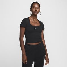 Grounded in style, comfort and versatility, meet our new luxury loungewear. This top's smooth jersey with a slight drape, making it perfect for everyday wear. Ruching on the sides and a square neck emphasize the snug fit. Versatile Fitted T-shirt For Loungewear, Fitted Black T-shirt For Loungewear, Stretch Elastane Tops For Loungewear, Sleek Stretch Tops For Loungewear, Sporty V-neck Top, V-neck Athleisure Top, Versatile Black Loungewear Tops, Sporty High Stretch Tops For Loungewear, High Stretch Sporty Tops For Loungewear